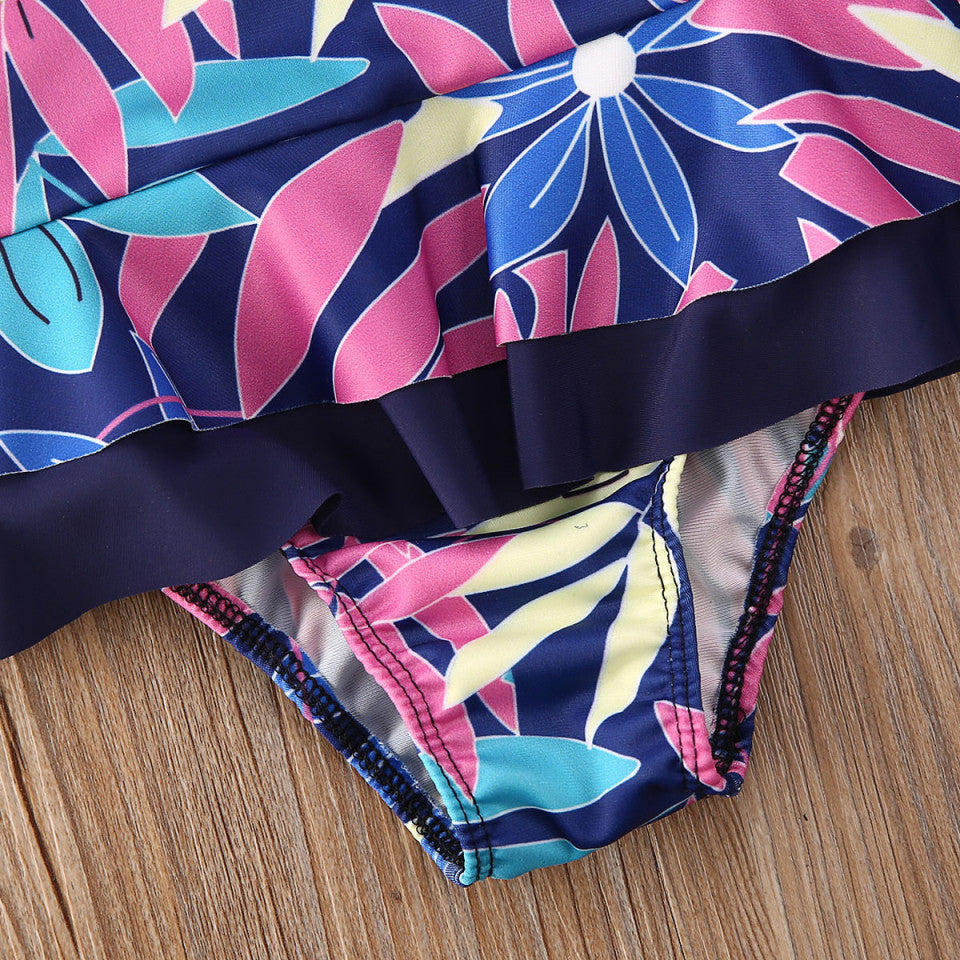 Costum de baie mov cu frunze si floricele aplicate