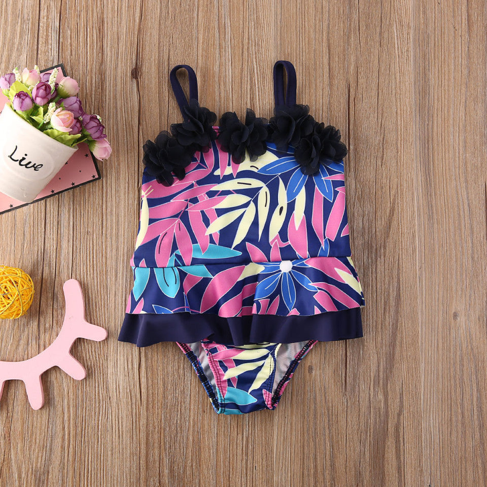 Costum de baie mov cu frunze si floricele aplicate