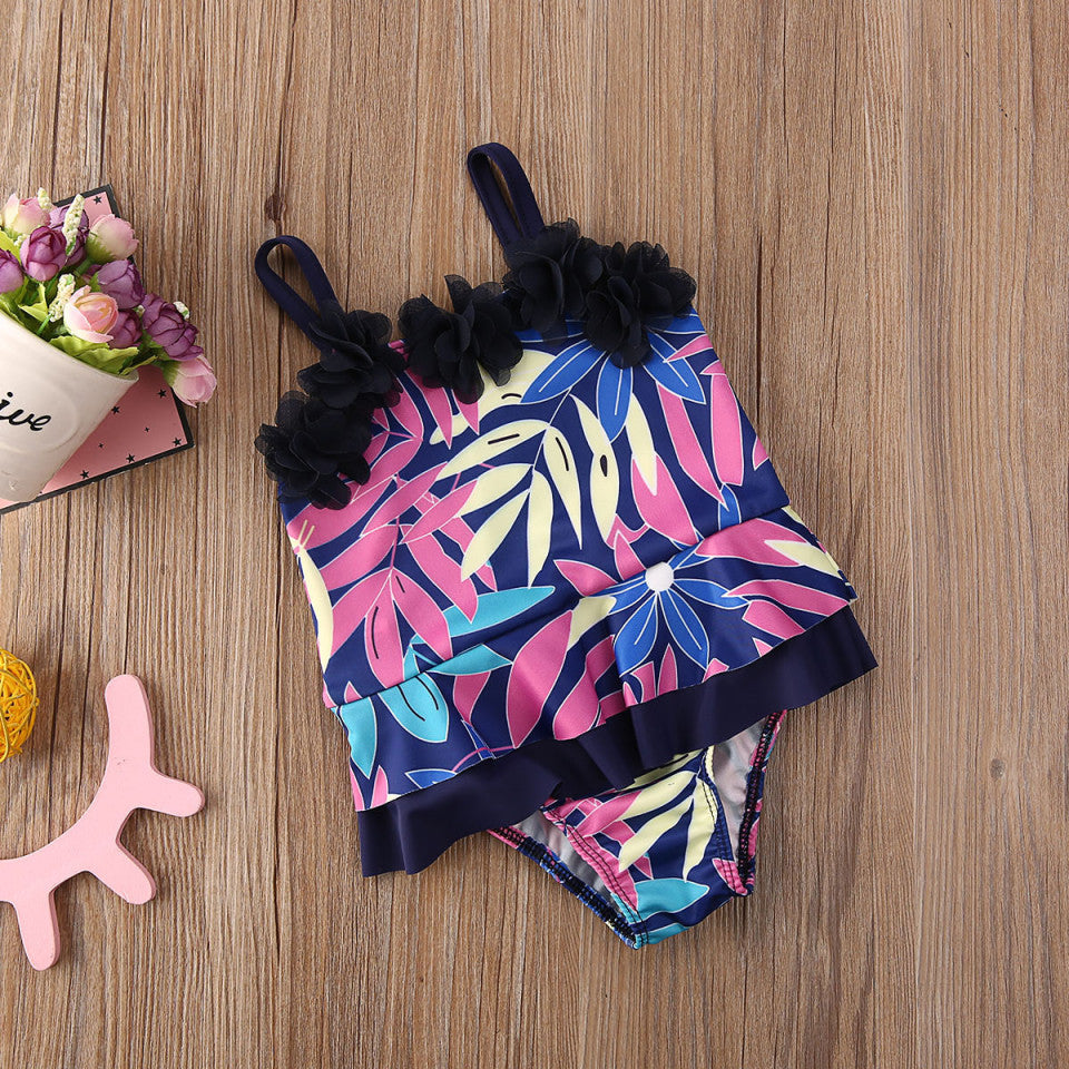 Costum de baie mov cu frunze si floricele aplicate