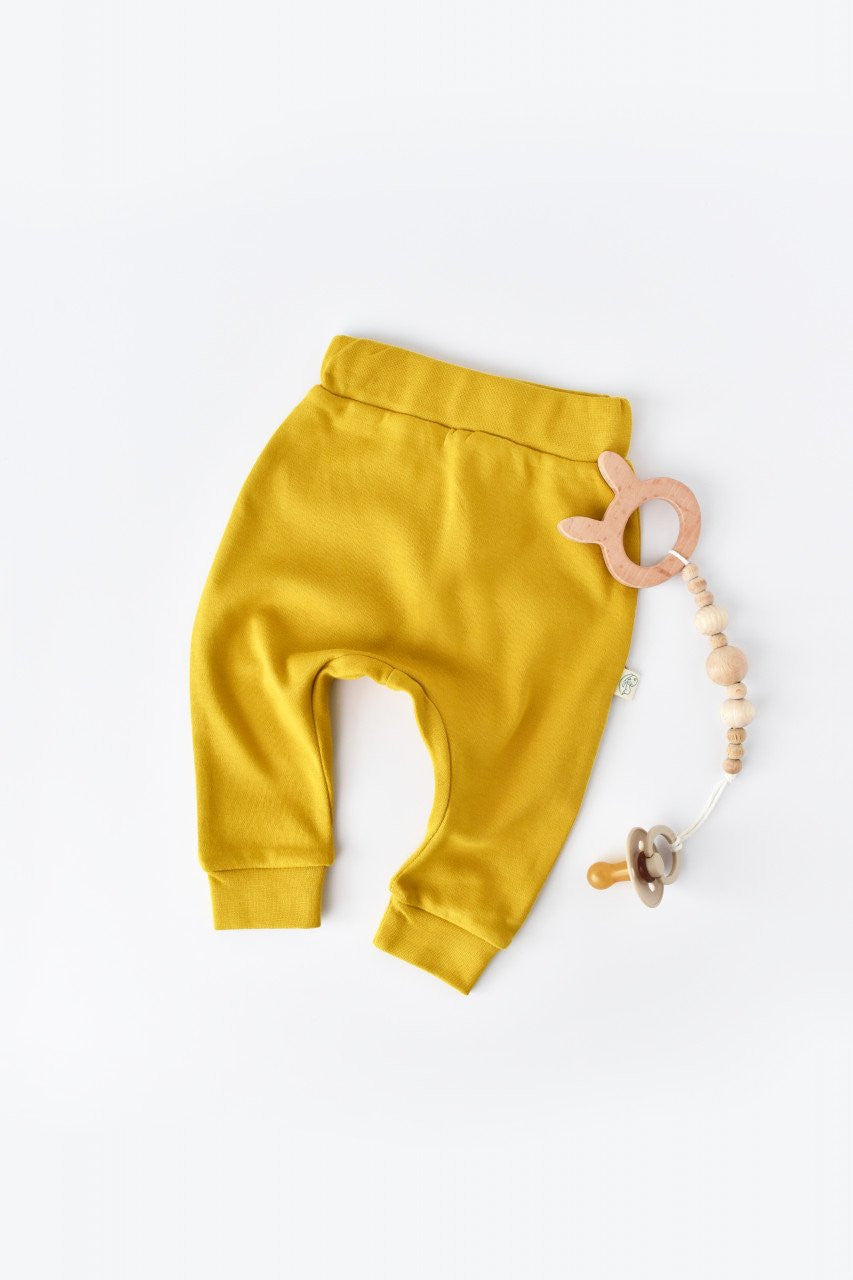 Pantaloni Bebe Unisex din bumbac organic Galben