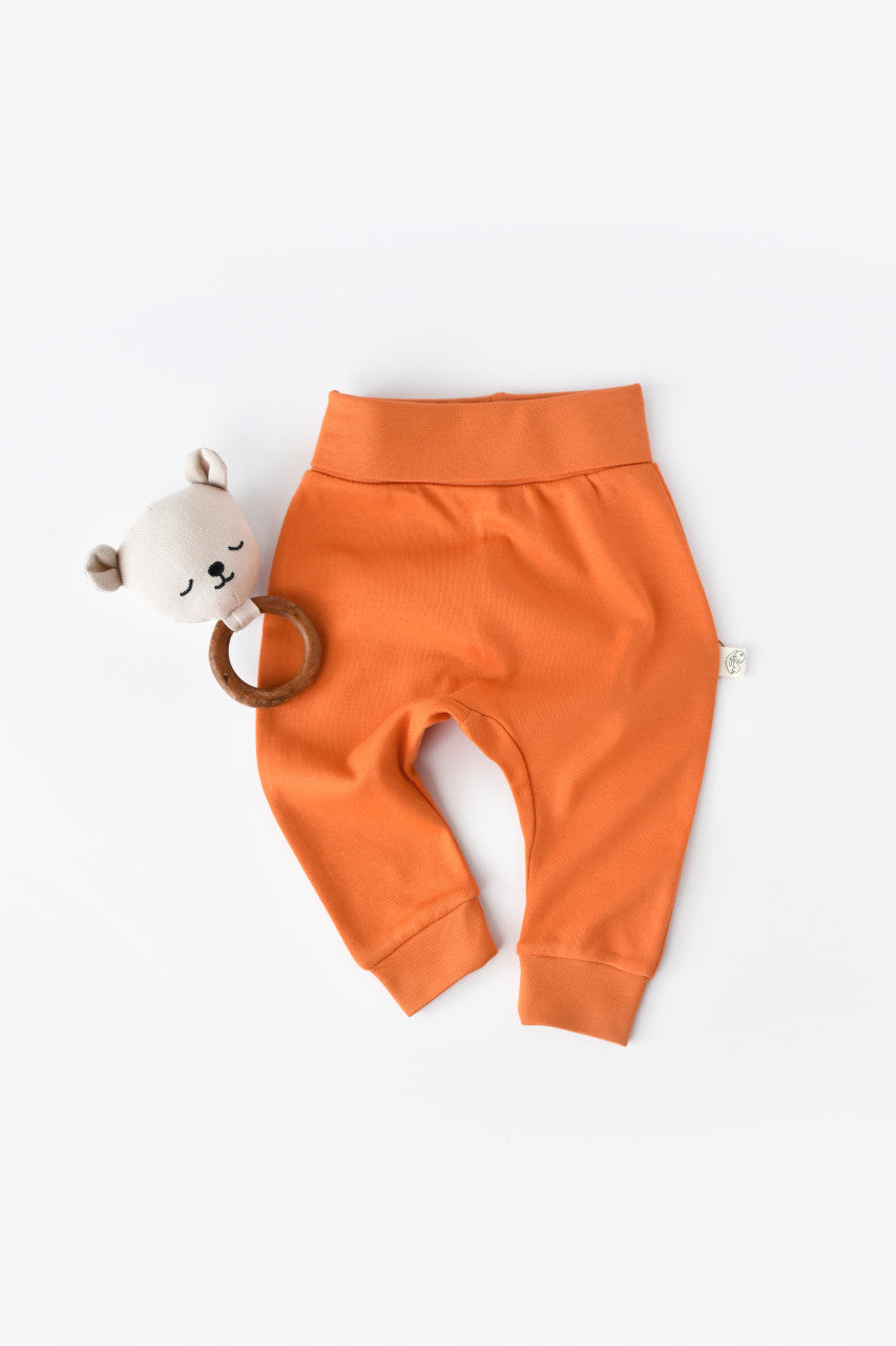 Pantaloni Bebe Unisex din bumbac organic Portocaliu